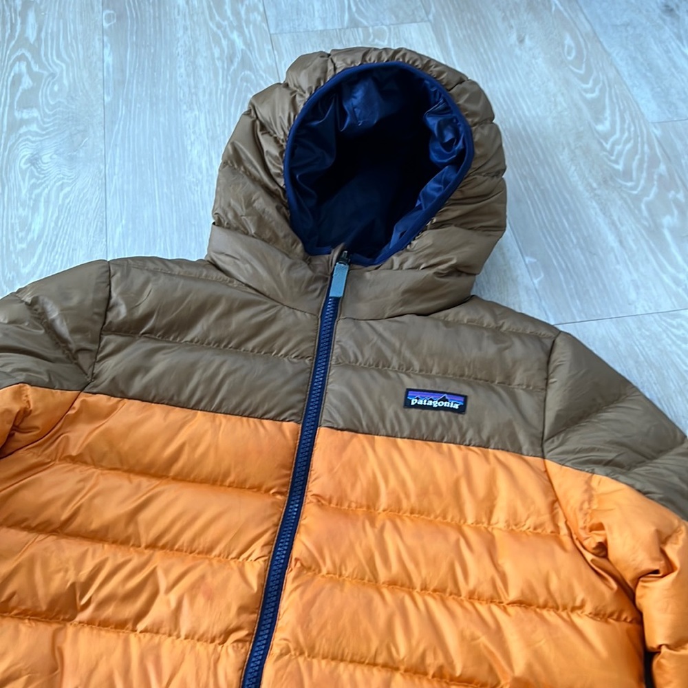 Patagonia. Boys Waterproof packs or puffer.